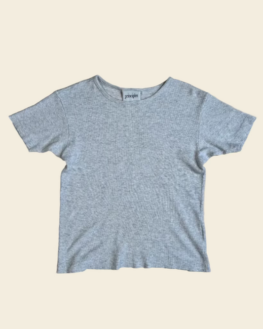 Grey t-shirt on a beige background